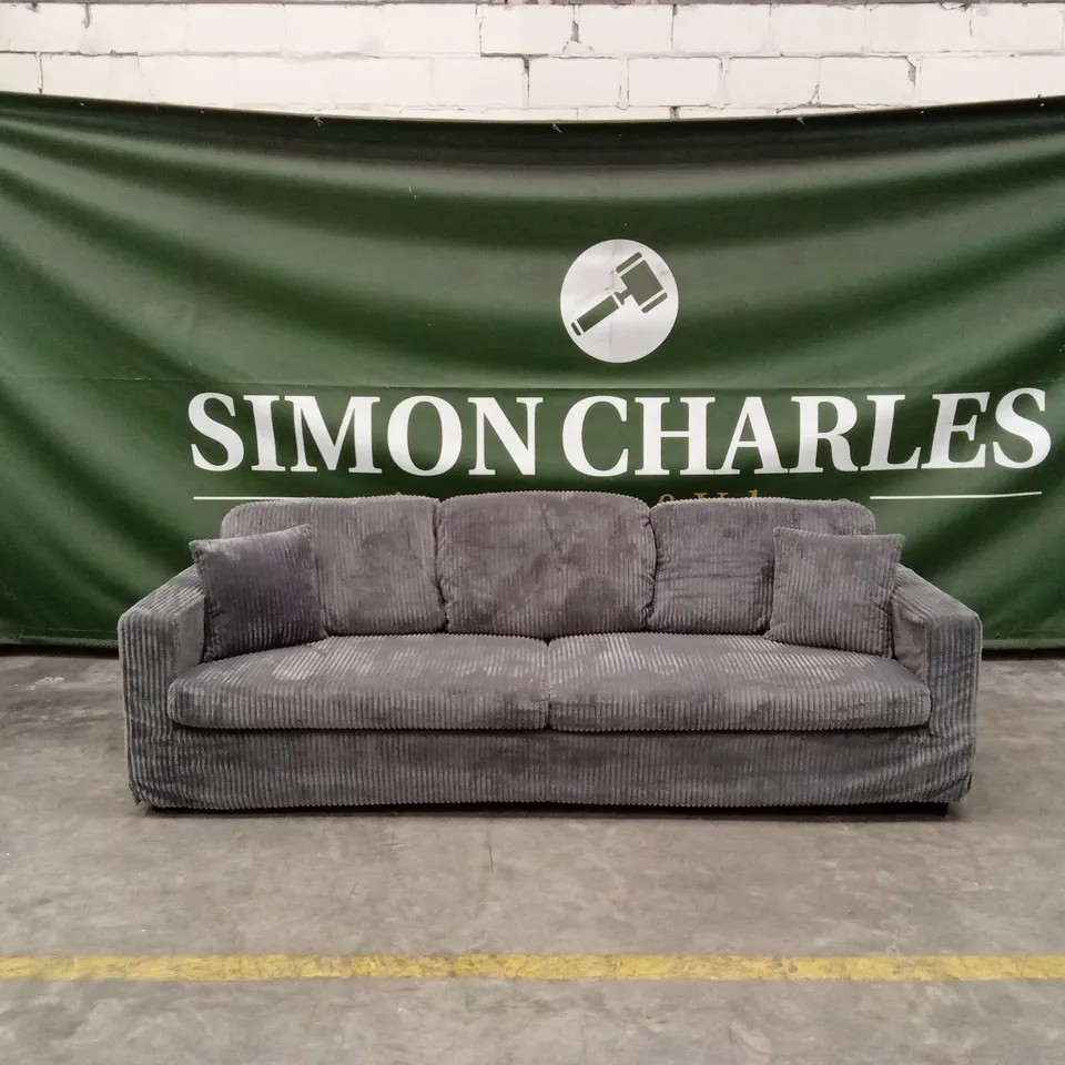 DESIGNER 4 SEATER FABRIC SOFA