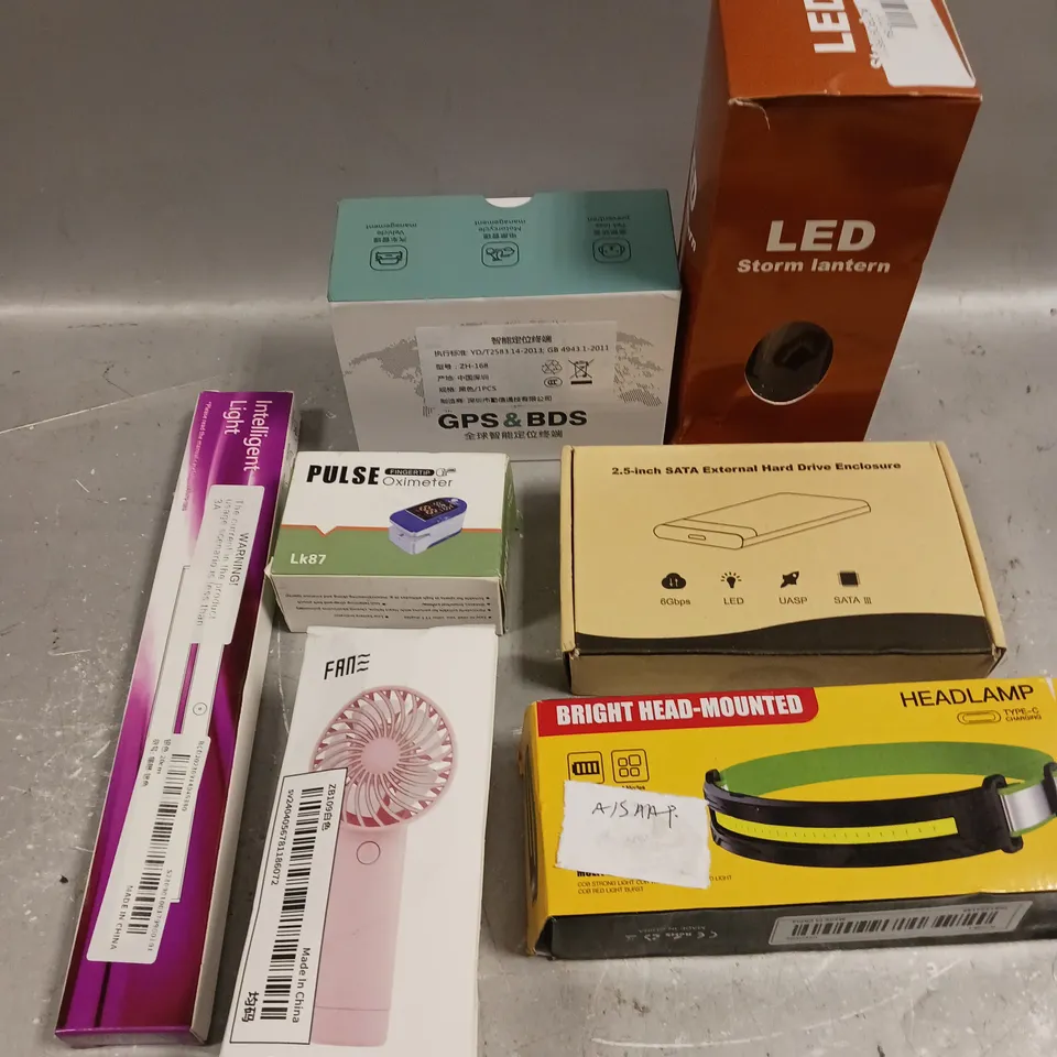APPROXIMATELY 10 ASSORTED ELECTRICAL PRODUCTS TO INCLUDE HEADLAMP, PULSE OXIMETER, HARD DRIVE ENCLOSURE ETC 
