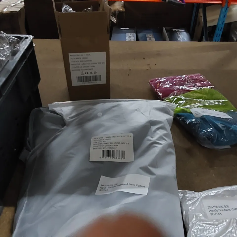 BOX OF ASSORTED ITEMS INCLU HANDY SOLUTIONS 8 PACK TRAVEL ORGANISER, 4 PACK OF BULB HOLDERS, INSTA COOL MAGIC TOWELS, 4 PACK CABLE TIDY, 