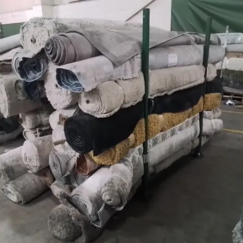 STILLAGE OF APPROXIMATELY 30 QUALITY DESIGNER RUGS