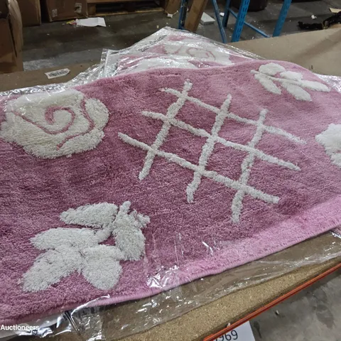 THREE DESIGNER PASTEL BATH MATS PINK
