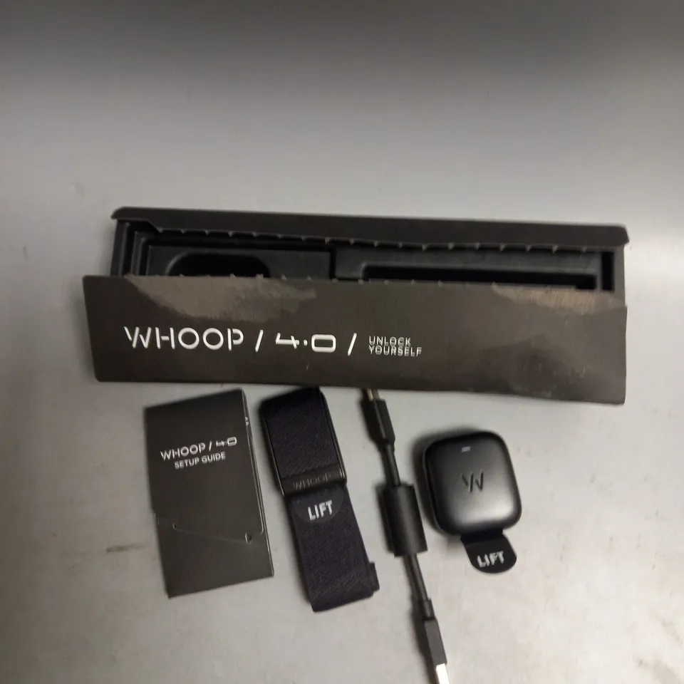 BOXED WHOOP WEARABLE FITNESS TRACKER IN BLACK