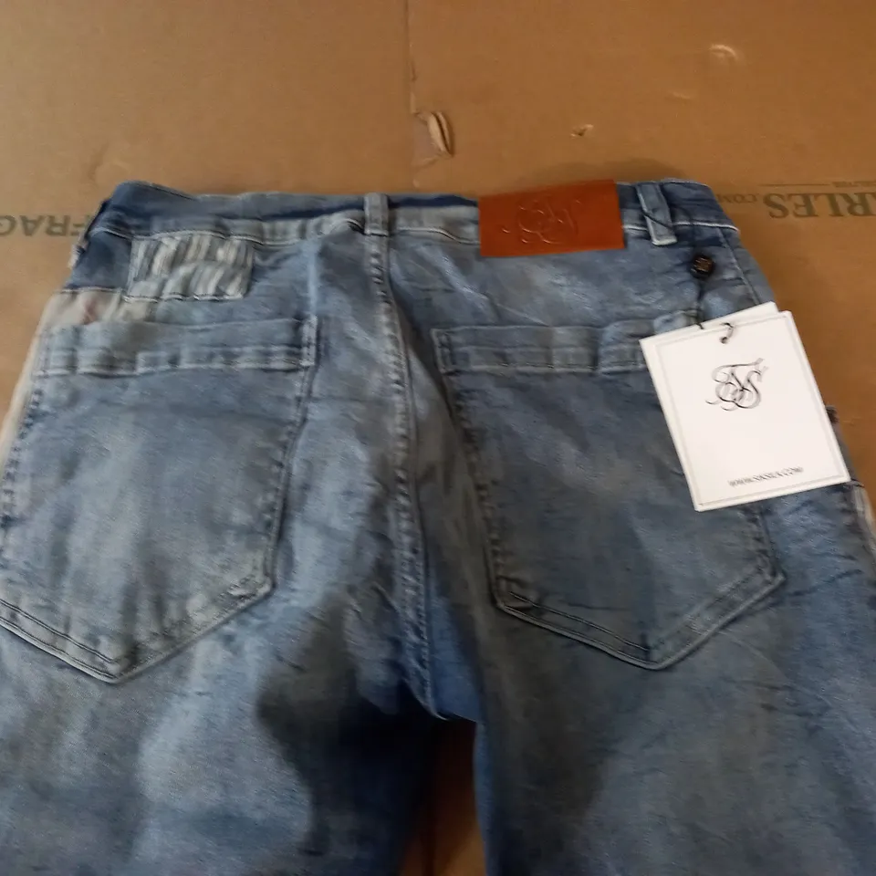 SIK SILK PATCHWORK SKINNY JEANS - M