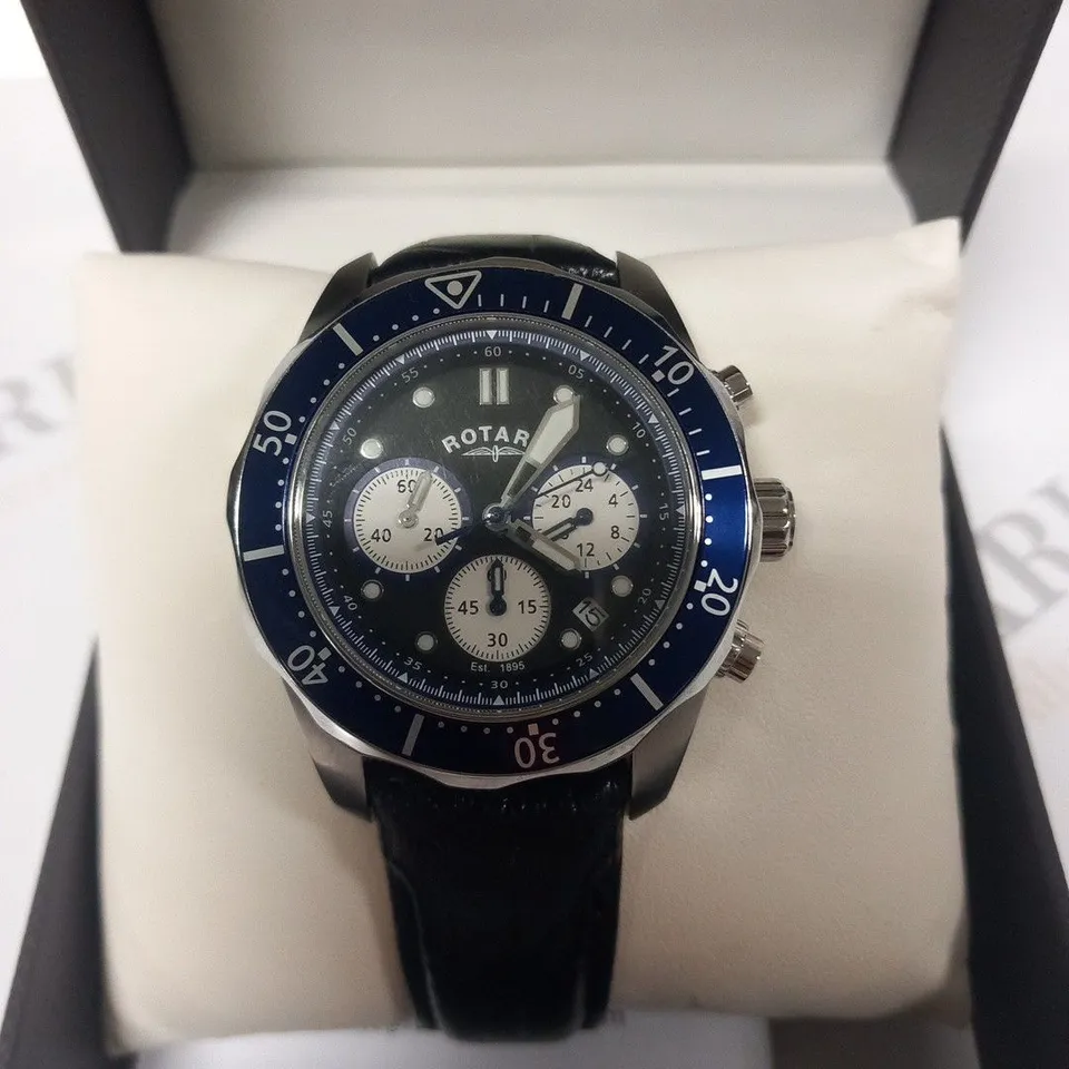 BOXED ROTARY BLACK LEATHER WRIST WATCH WITH SILVER/NAVY FACE 