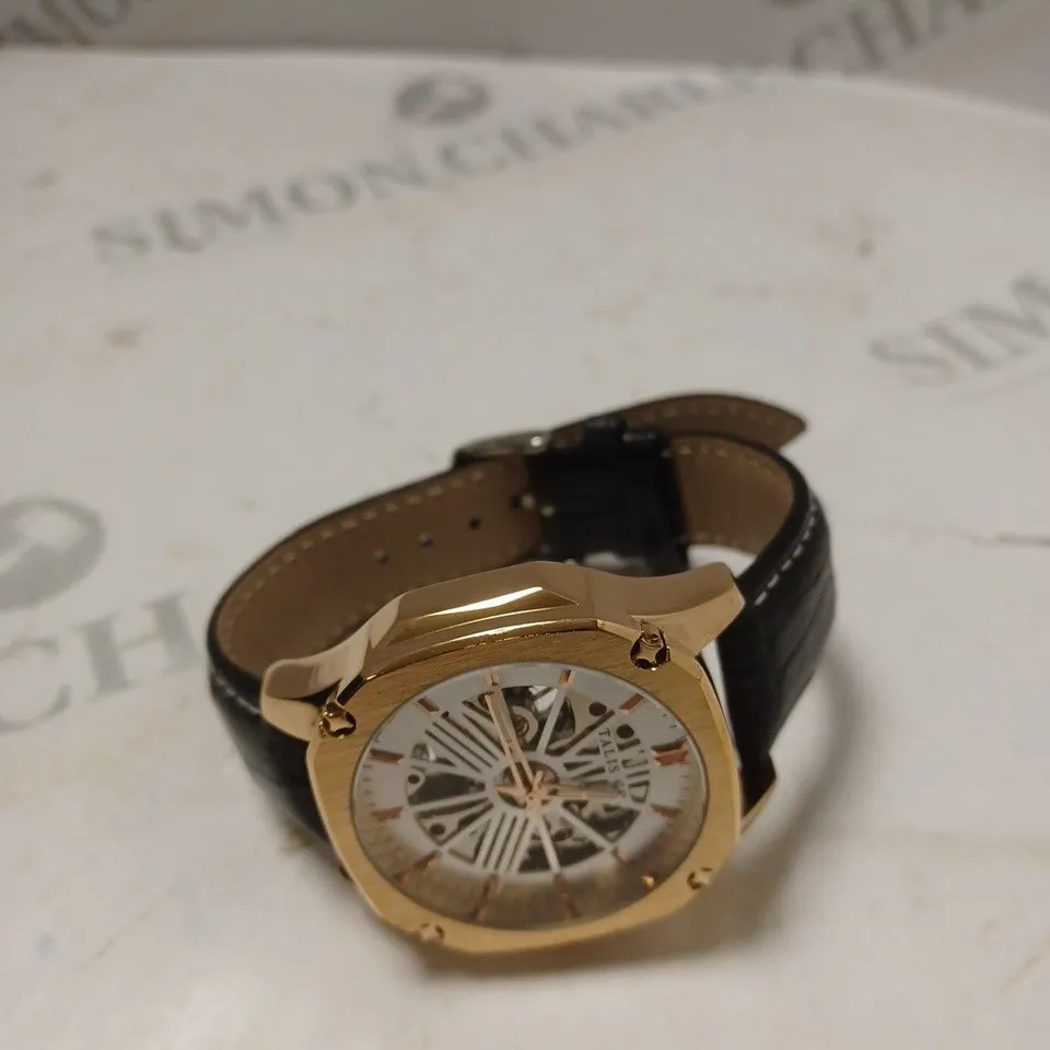 MEN’S TALIS CO 9185 AUTOMATIC SKELETON WATCH – BLACK DIAL – GOLD COLOUR CASE – GLASS EXHIBITION CASE BACK – LEATHER STRAP