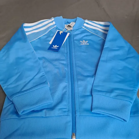 ADIDAS LIGHT BLUE TRACKSUIT JACKET - UK 5-6 YEARS