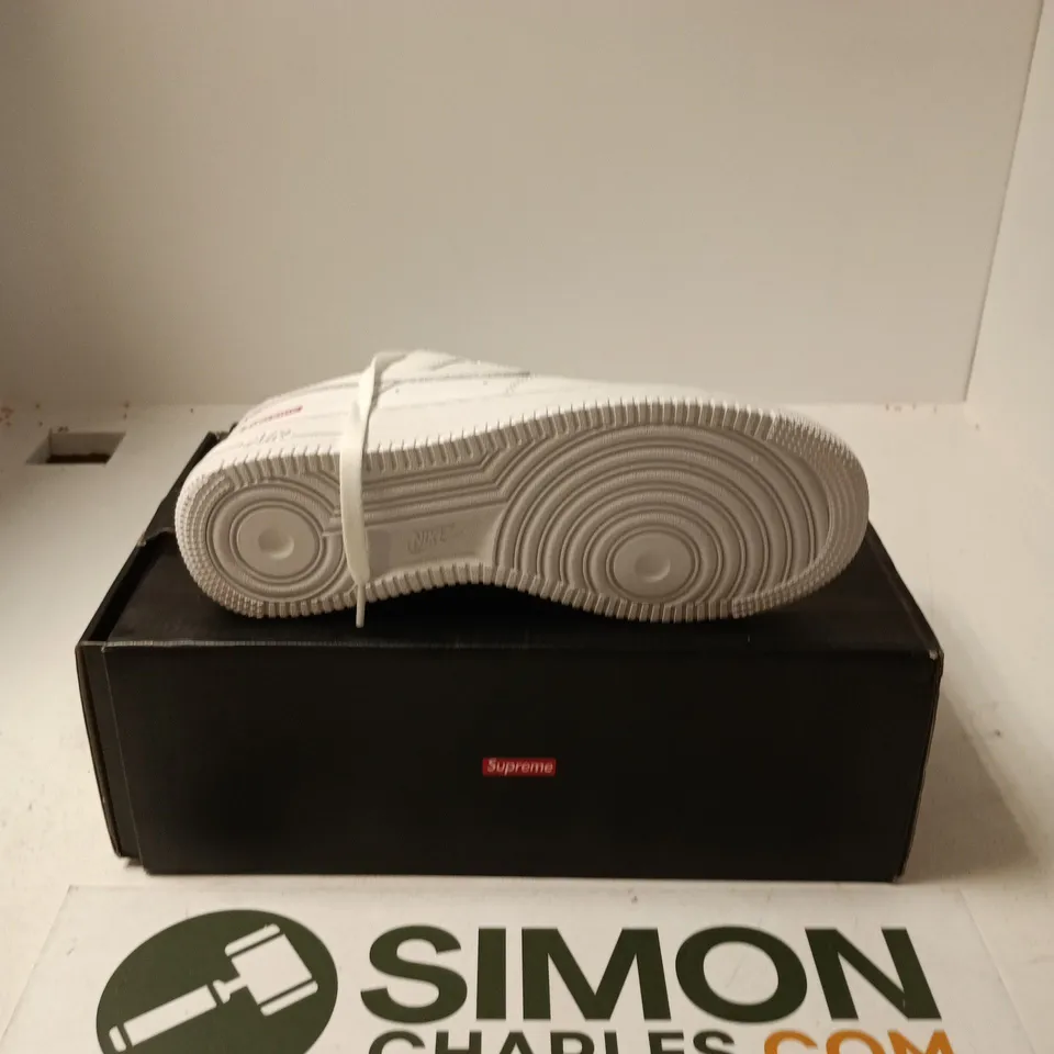 BOXED PAIR OF NIKE AIR FORCE 1 LOW SUPREME TRAINERS IN WHITE - UK 7.5