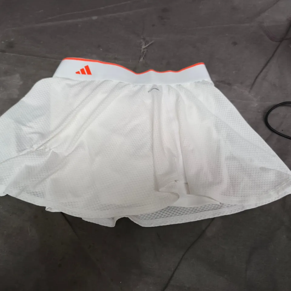 ADIDAS WHITE SKIRT PRO – WOMEN'S ATHLETIC SKIRT WITH ORANGE TRIM
