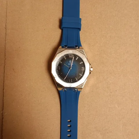 BOXED RUCKSTUHL STAINLESS STEEL WATCH WITH BLUE SILICONE STRAP