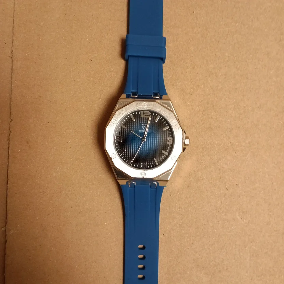 BOXED RUCKSTUHL STAINLESS STEEL WATCH WITH BLUE SILICONE STRAP