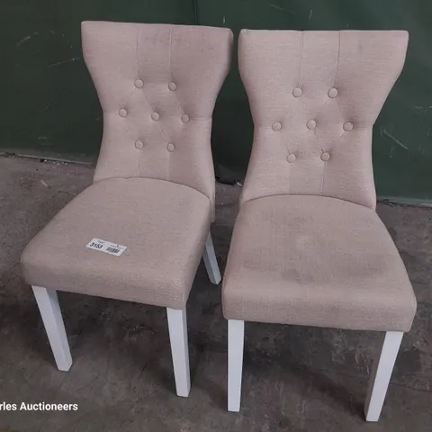 PAIR OF UPHOLSTERED BUTTONED BACK DINING CHAIRS NATURAL FABRIC ON WHITE PAINTED LEGS 