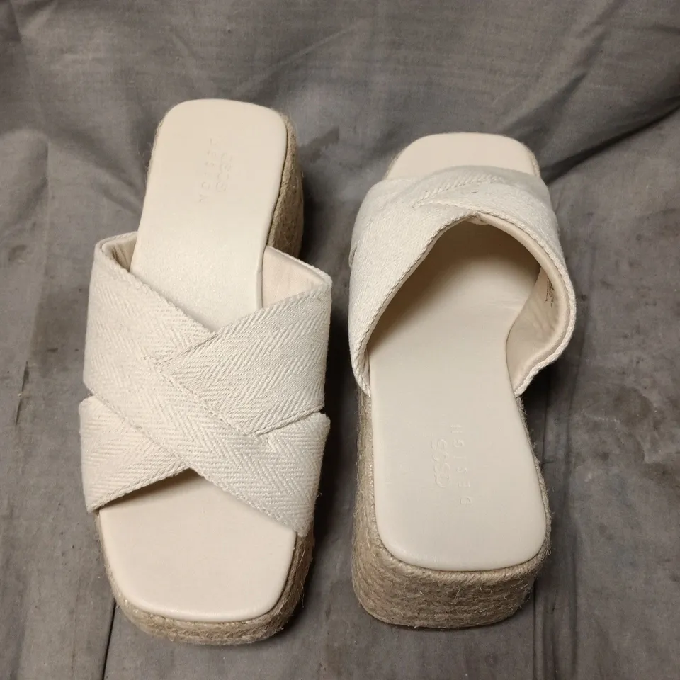 ASOS DESIGN WIDE FIT TEDDY 2 CROSS STRAP WEDGE SANDALS – NATURAL, UK 7