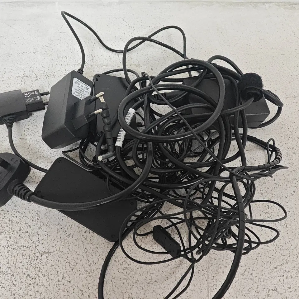 LOT OF ASSORTED TECH ITEMS TO INCLUDE REMOTES,ETHERNET CABLE AND POWER ADAPTER