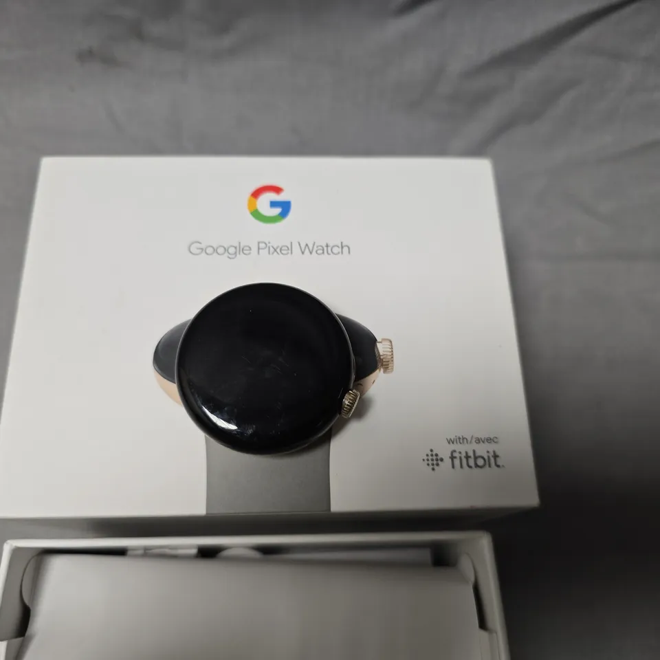 GOOGLE PIXEL WATCH – GOLD-TONE CASE, BLACK DISPLAY (BOXED, FITBIT BRANDING)