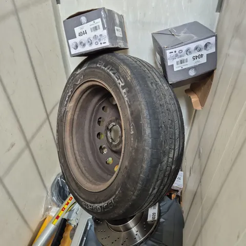 CAGE OF APPROXIMATELY 10 ASSORTED ITEMS TO INCLUDE SUSPENSION OFF ROAD DAMPING SYSTEM, BOXED BICYCLE INNER TUBE AND BRAKE DISC - COLLECTION ONLY