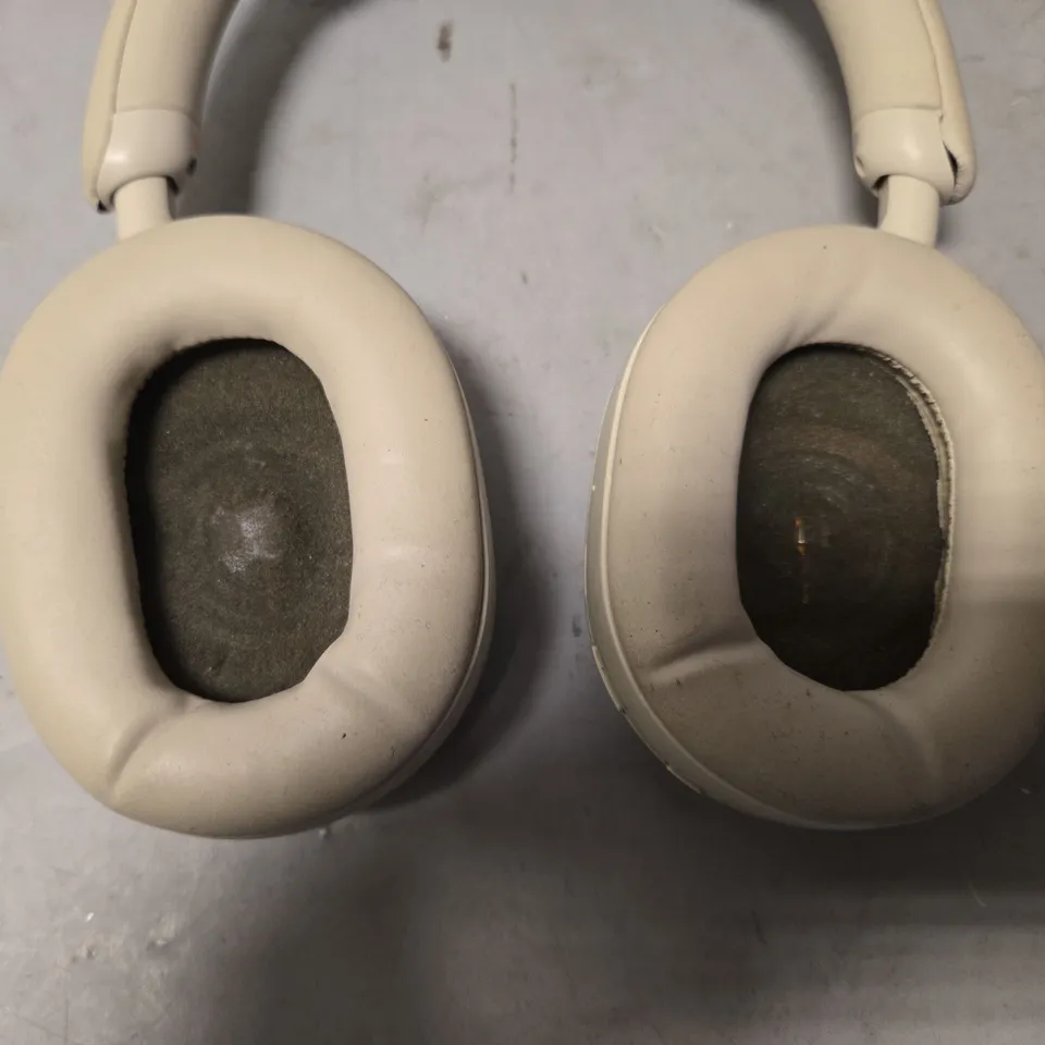 SONY EARPHONES IN BEIGE - MODEL UNSPECIFIED 