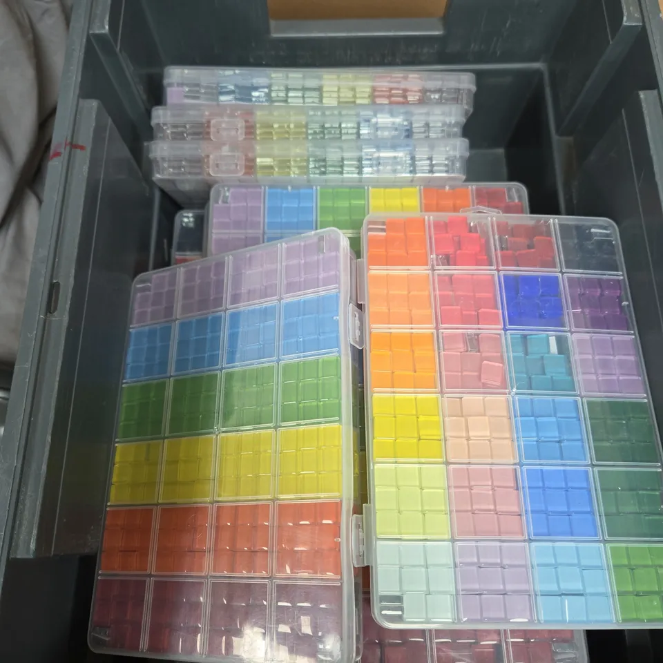 APPROXIMATELY 15 PACKS OF SMALL GLASS MOSAIC TILES IN ASSORTED COLOURS
