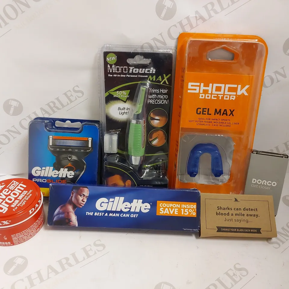 BOX OF APPROX 20 MALE COSMETIC ITEMS TO INCLUDE ASSORTED BLADES FOR RAZORS, MICROTOUCHMAX AND SHOCK DOCTOR GEL MAX MOUTHGUARD
