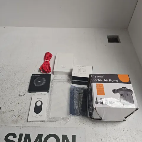 TOTE OF APPROXIMATELY 15 ASSORTED ITEMS INCLUDING CRYSTALS ELECTRIC AIR PUMP, A PLASTIC PHONE CASE AND A SAMSUNG GALAXY SMART TAG2
