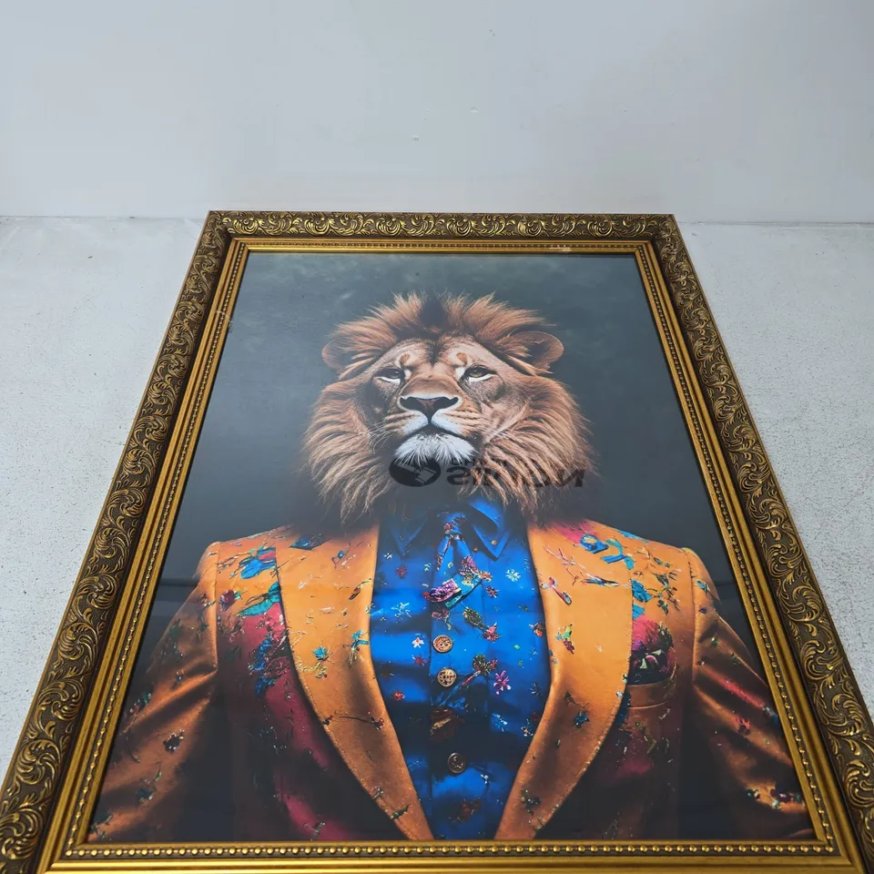 FRAMED LION PORTRAIT IN COLOURFUL SUIT 