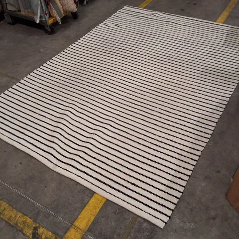 STRIPED AREA RUG – WHITE WITH DARK STRIPES APPROXIMATELY 200×280CM