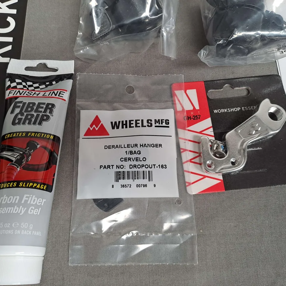 LOT OF 9 ASSORTED M-PART CYCLING ITEMS TO INCLUDE KICKSTAND, BELLS AND DERAILLEUR HANGER