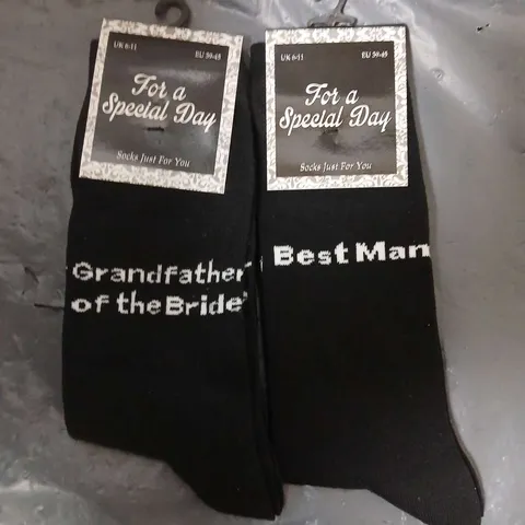 APPROXIMATELY 50 ASSORTED WEDDING SOCKS IN BLACK IN VARIOUS SIZES