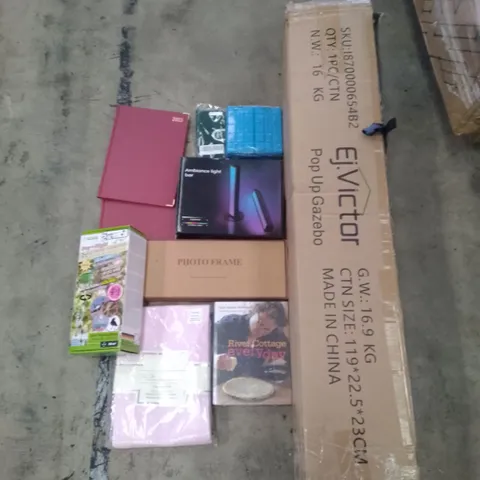 PALLET OF ASSORTED ITEMS INCLUDING PHOTO FRAMES, AMBIANCE LIGHT BAR, POP UP GAZEBO, ELECTRONIC SCARECROW, RIVER COTTAGE EVERYDAY BOOK, 2023 PLANNER