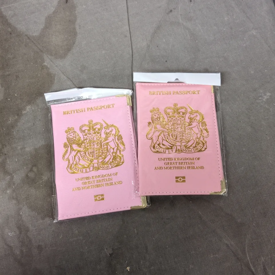 TOTE OF APPROXIMATELY 12 ASSORTED ITEMS TO INCLUDE: PINK UK PASSPORT COVERS 