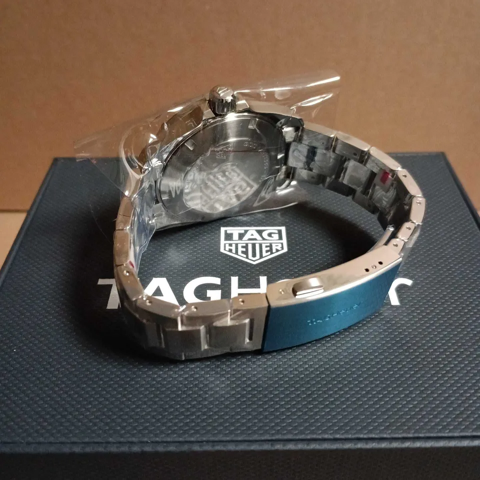 TAG HEUER STAINLESS STEEL WATCH WITH BLUE BEZEL 