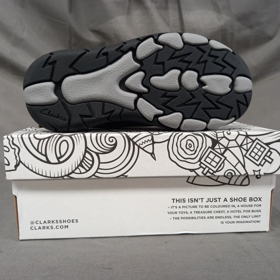 BOXED PAIR OF CLARKS REX STRIDE KIDS SHOES IN BLACK UK SIZE 9.5