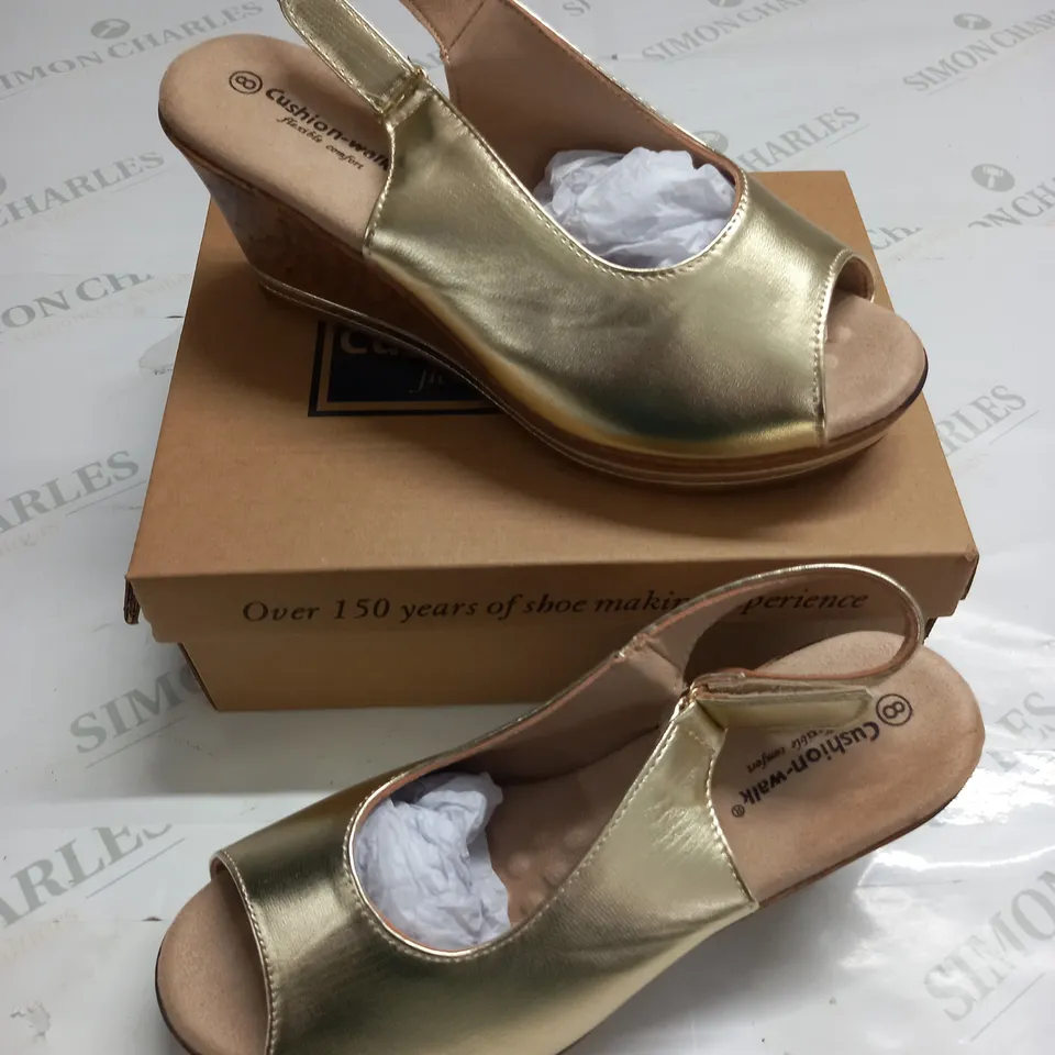 BOXED PAIR OF CUSHION WALK GOLD WEDGE HEELED SHOES - 8