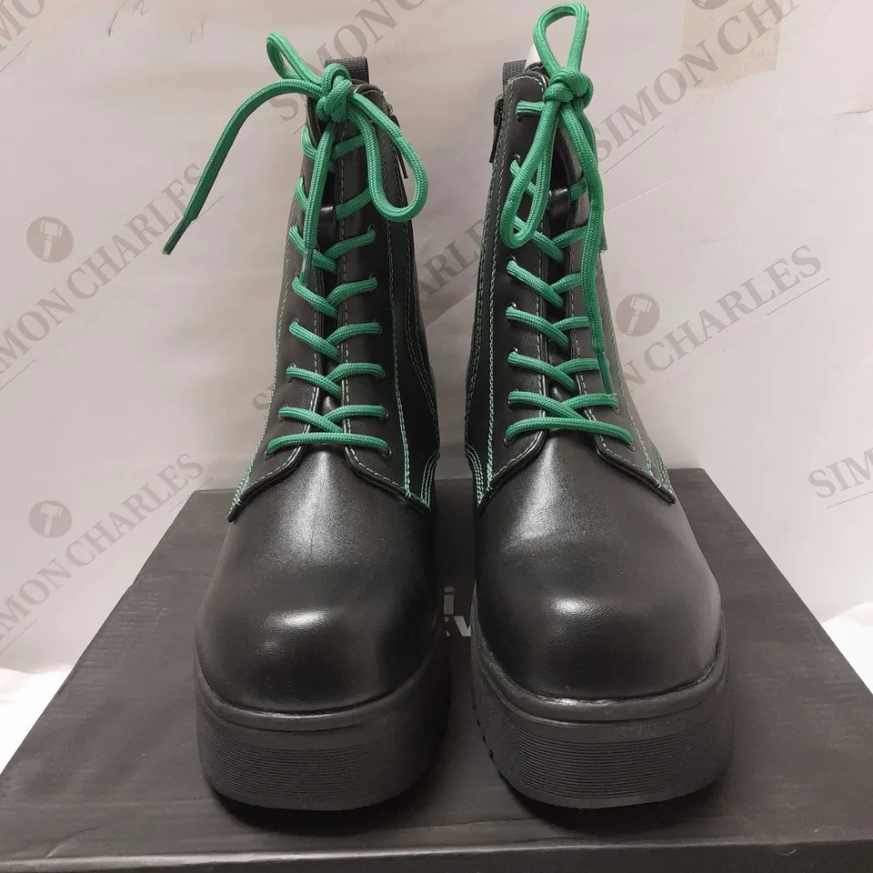 KOI BLACK PU/GREEN STITCHES LACE UP BOOTS - SIZE 6