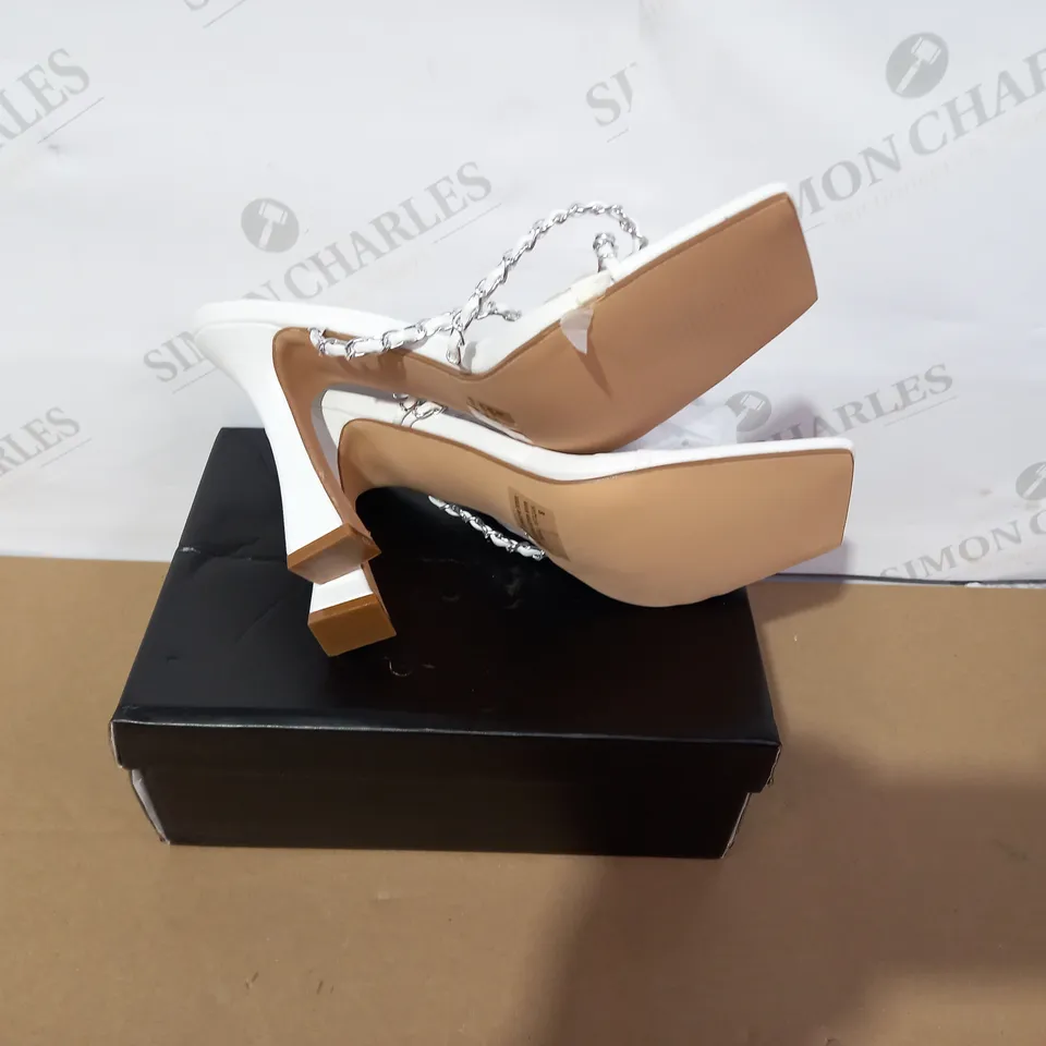 BOXED PAIR OF EGO WHITE HIGH HEELS SIZE 8