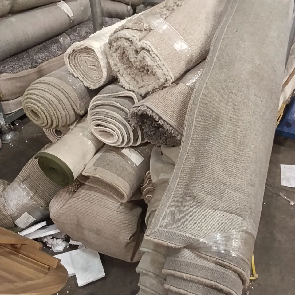 STILLAGE OF DESIGNER RUGS APPROXIMATELY 15 LARGE RUGS