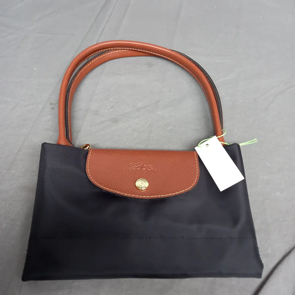 LONGCHAMP BLACK FOLD OUT HAND BAG