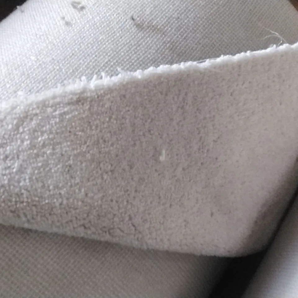 ROLL OF CREAM WHITE CARPET APPROXIMATELY 5M X 10M