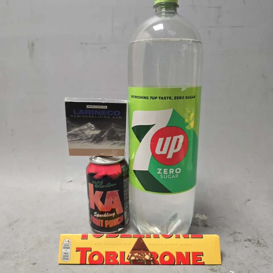APPROXIMATELY 7 ASSORTED FOOD & DRINK ITEMS TO INCLUDE - 7UP , TOBLERONE ETC