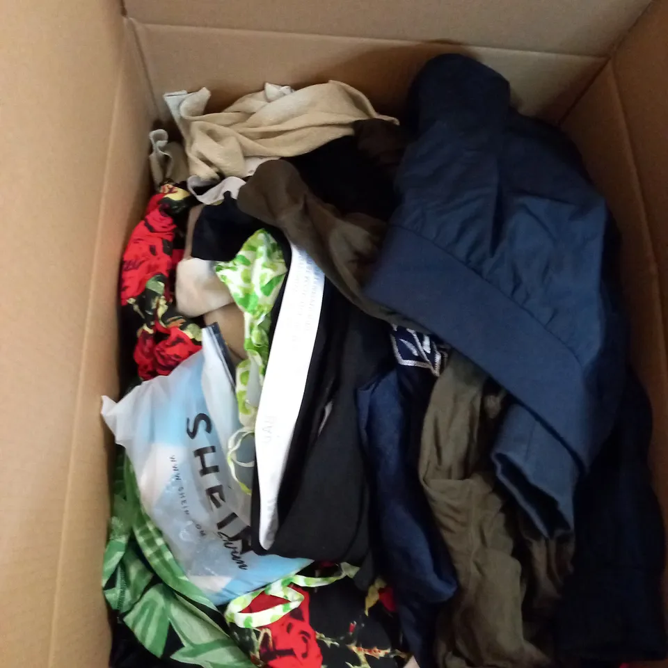  BOX OF ASSORTED CLOTHING ITEMS TOO INCLUDE DRESSES , SHIRTS AND TROUSERS IN VARIOUS SIZES AND COLOURS   