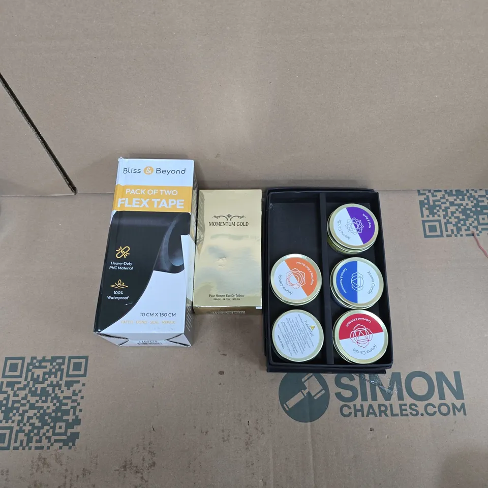 LARGE QUANTITY OF ASSORTED ITEMS TO INCLUDE ASSORTED SCENTED CANDLES, MENS MOMENTUM GOLD AFTERSHAVE, PACK OF 2 FLEX TAPE, ETC - COLLECTION ONLY