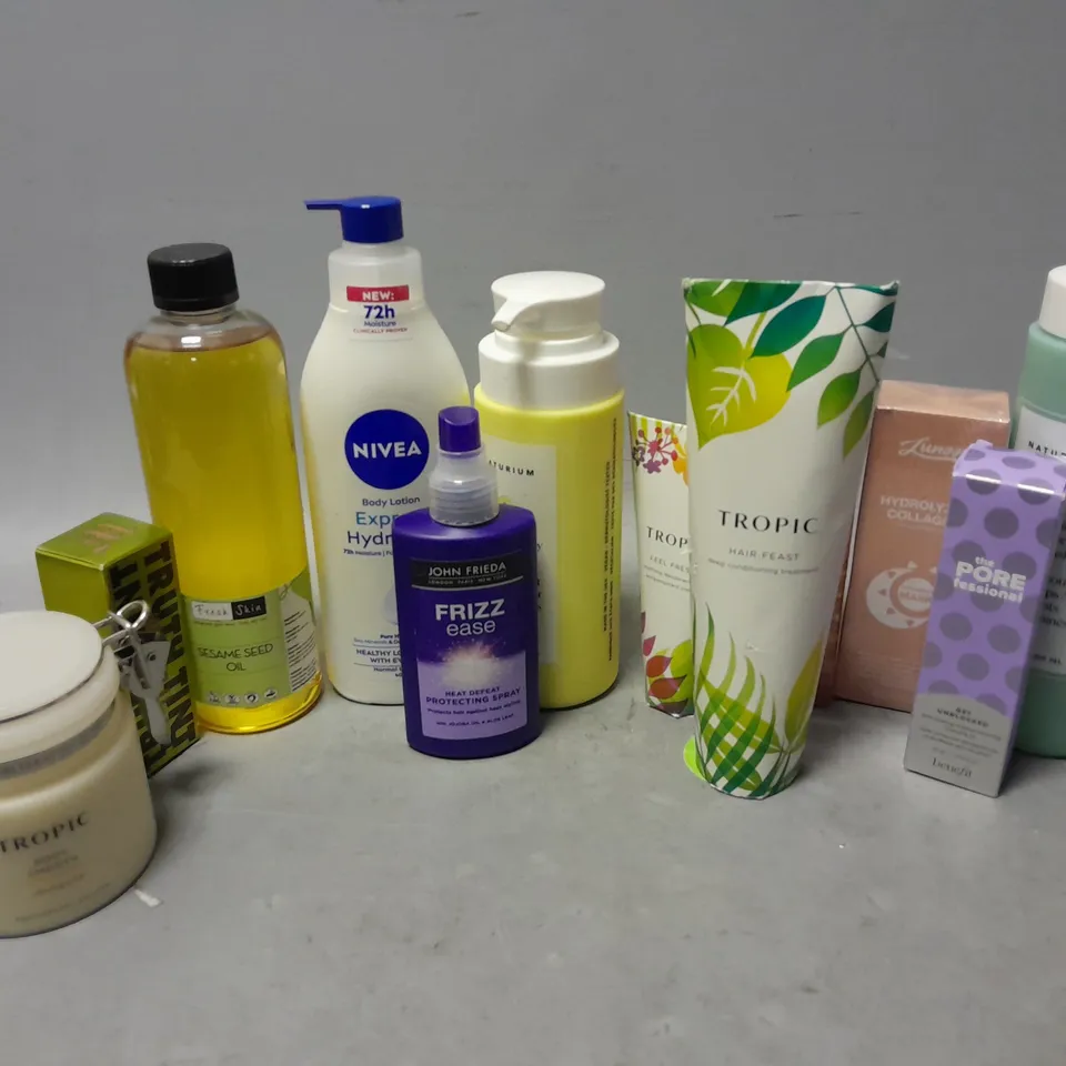 APPROXIMATELY 20 ASSORTED COSMETICS ITEMS TO INCLUDE NATURIUM MULTIVITAMIN BODY WASH (500ml), TROPIC BODY SMOOTH (250ml), GOLDEN BROWN BODY SHIMMER OIL (80ml), ETC