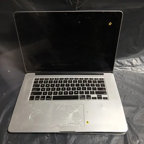 APPLE MACBOOK PRO LAPTOP MODEL A1398 – DAMAGED LCD SCREEN AND DENTED CHASSIS