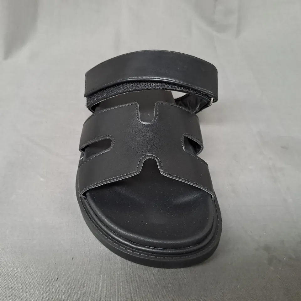 BOXED PAIR OF DESIGNER OPEN TOE FLAT SANDALS IN BLACK EU SIZE 36