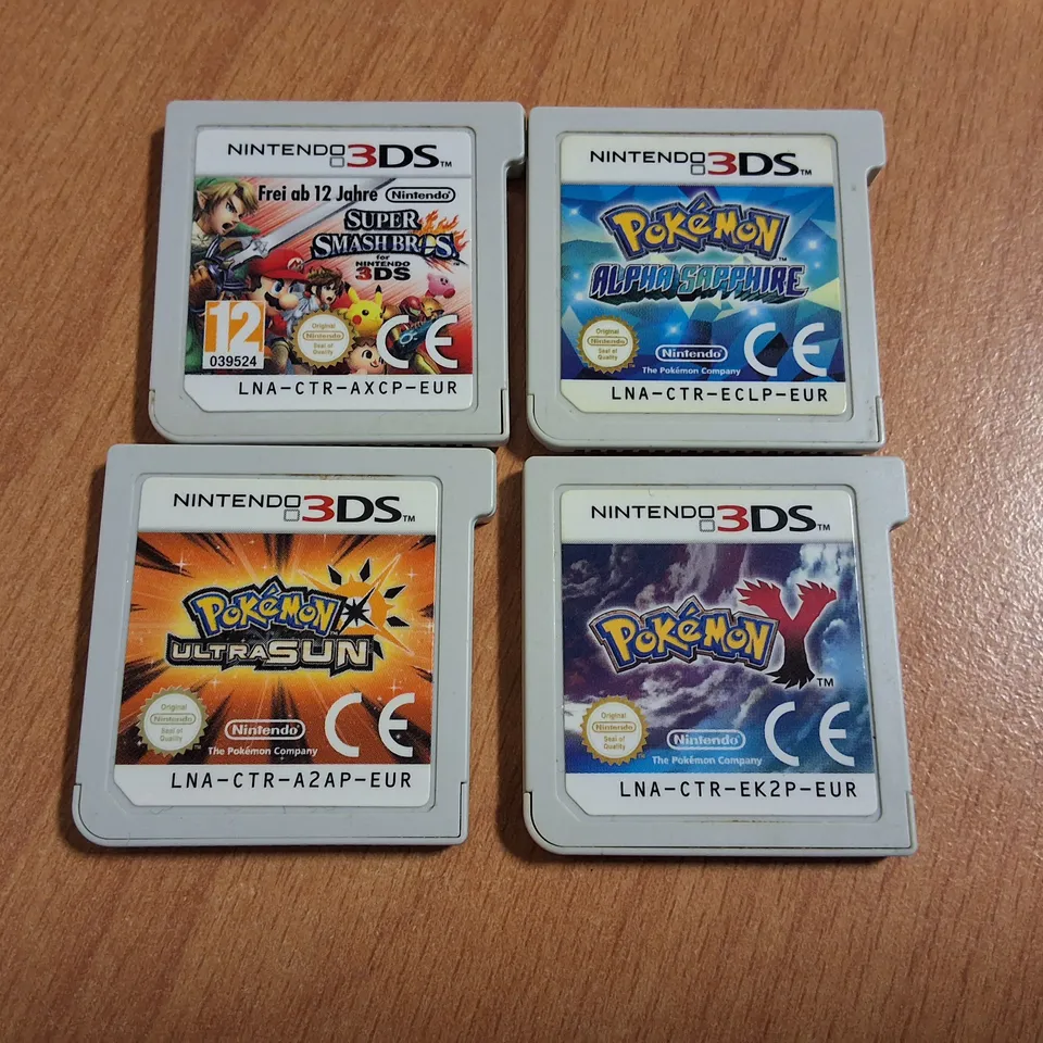 LOT OF 4 UNBOXED NINTENDO SWITCH GAMES TO INCLUDE POKEMON ULTRA SUN, POKEMON Y AND SUPER SMASH BROTHERS
