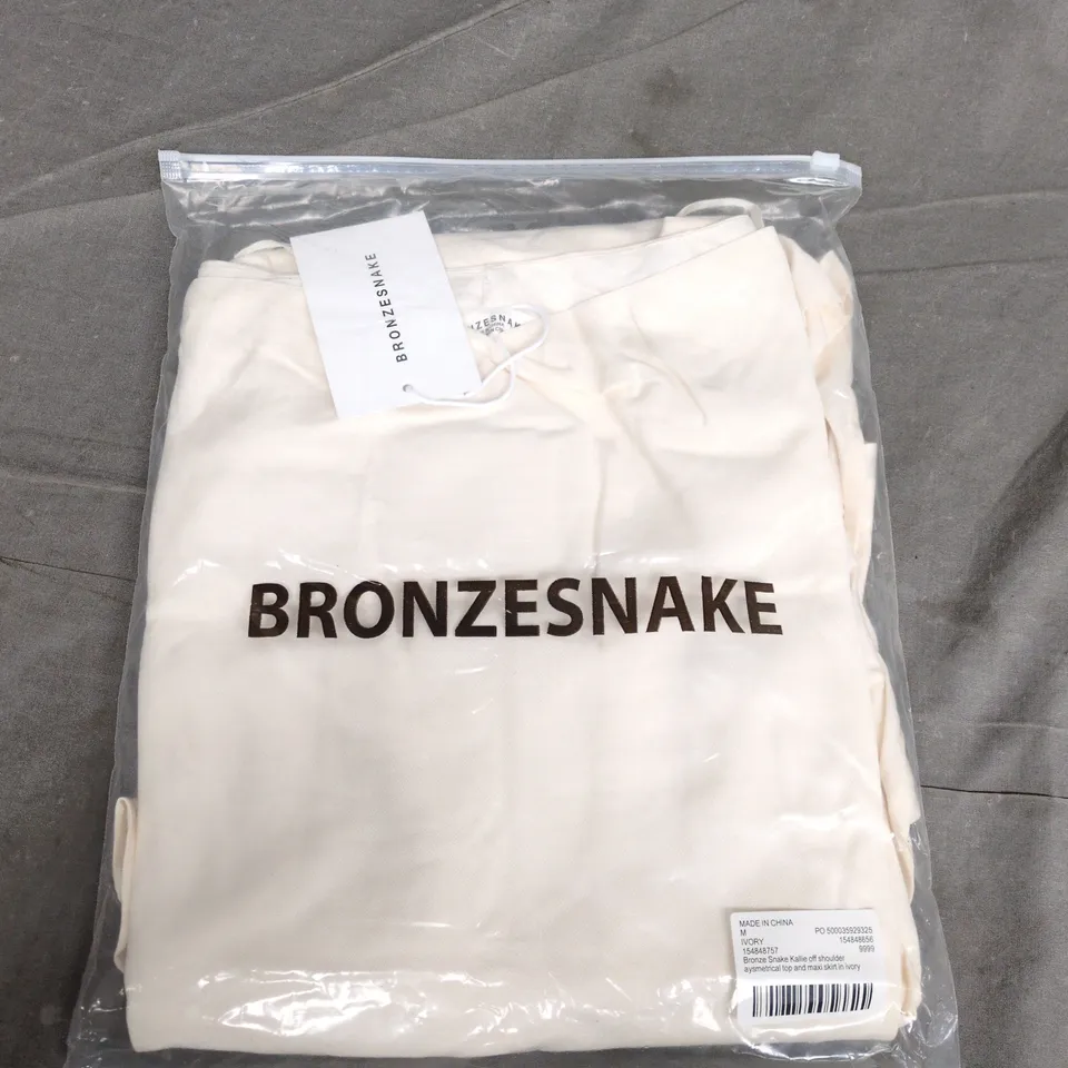 BAGGED BRONZESNAKE KALLIE OFF SHOULDER ASYMETRICAL TOP AND MAXI SKIRT IN IVORY - MEDIUM