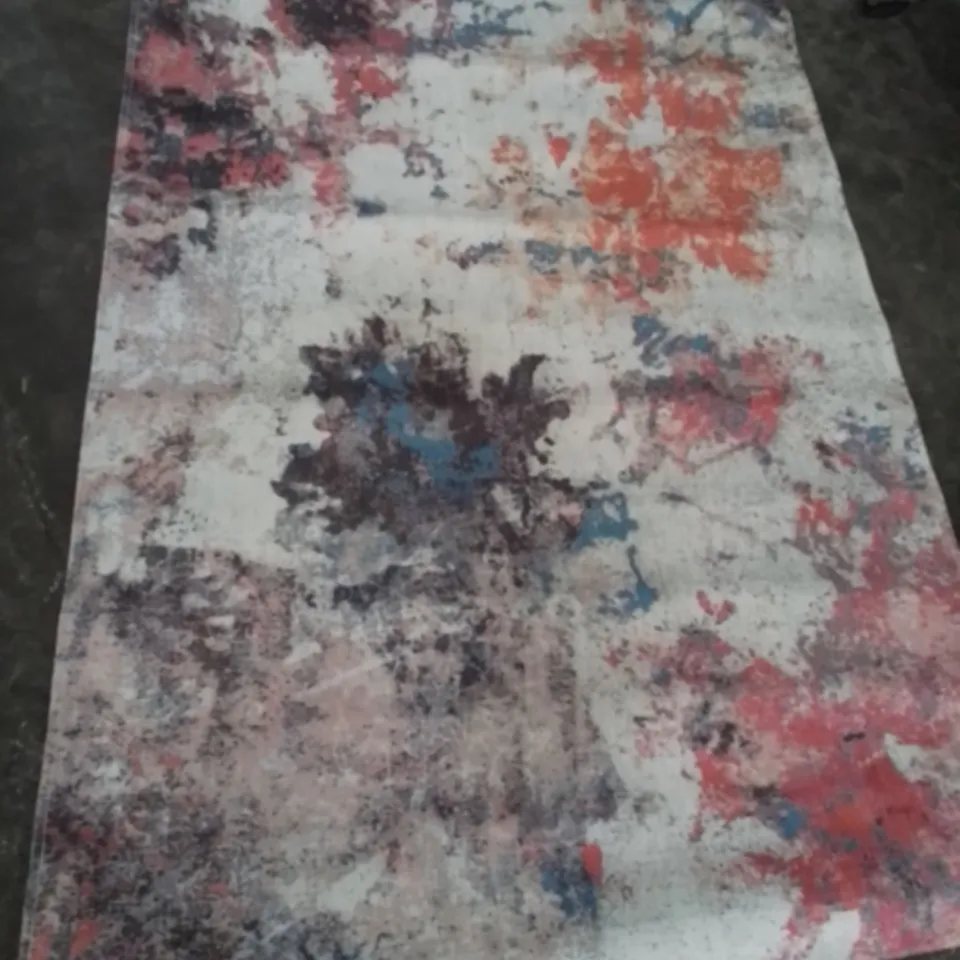 DESIGNER RUG WITH VARIED COLOURS 174X114CM