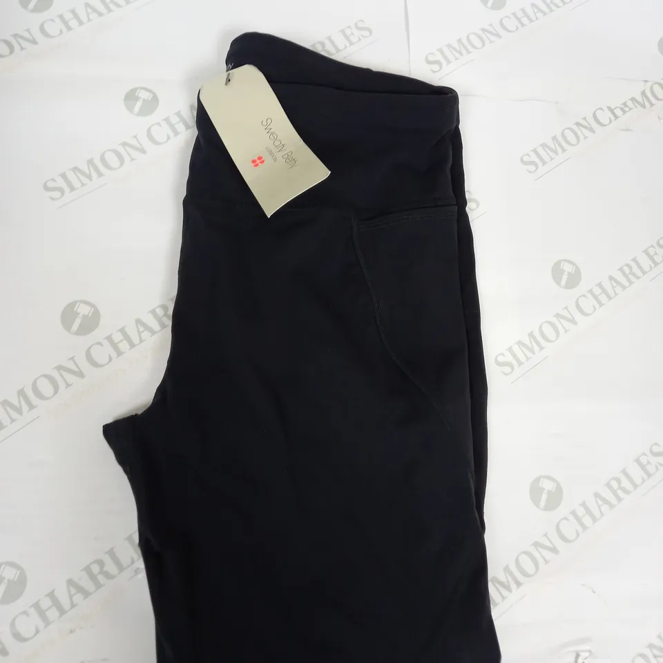 SWEATY BETTY POWER 7-8 WORKOUT LEGGINGS SIZE L ( HOLE IN LEGGINGS)