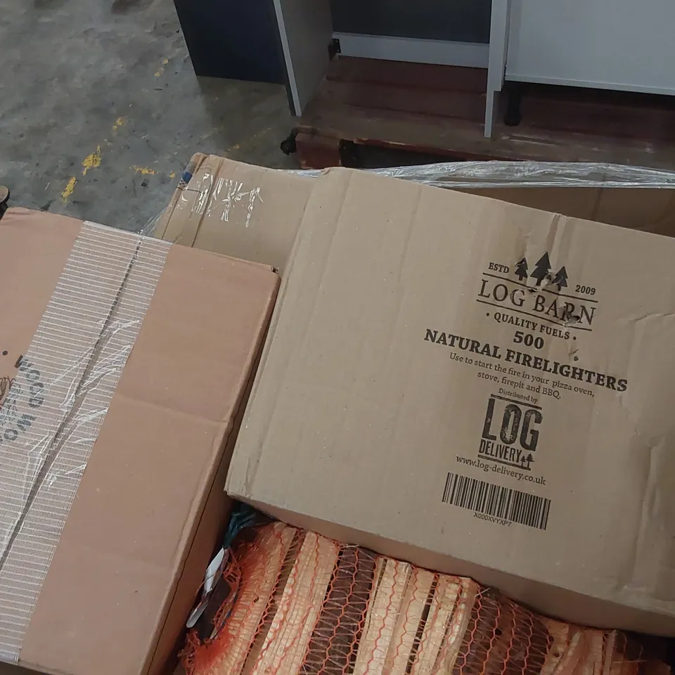 PALLET CONTAINING A LARGE ASSORTMENT OF FIRE WOOD, KINDLING, FIRELIGHTERS ECT