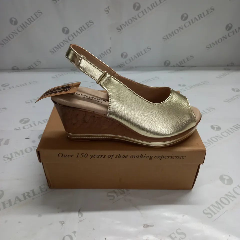 BOXED PAIR OF CUSHION WALK WEDGE SHOES IN GOLD - SIZE 6