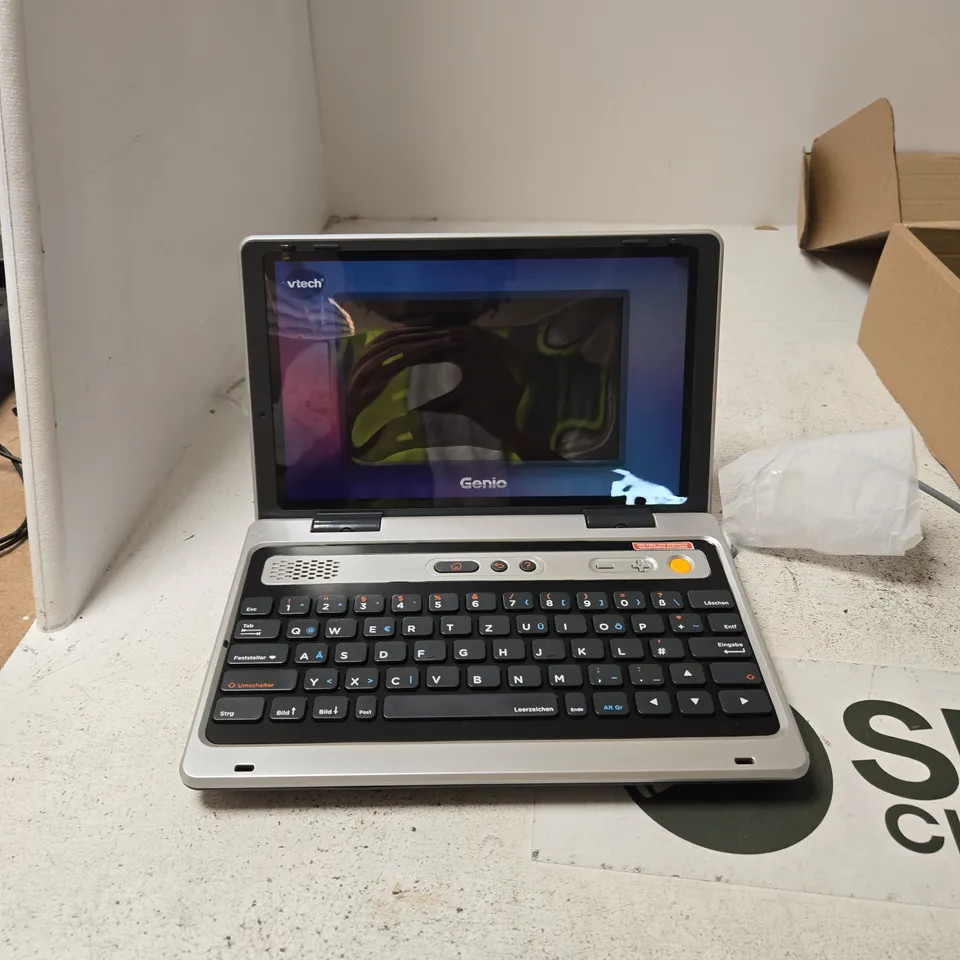 VTECH GENIO EDUCATIONAL LAPTOP – SILVER CLAMSHELL GERMAN QWERTZ LAYOUT